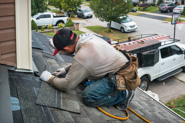 Professional Emergency Roof Repair technician working in Yoder, WY